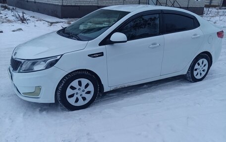 KIA Rio III рестайлинг, 2014 год, 810 000 рублей, 17 фотография