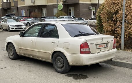 Mazda Familia, 1999 год, 375 000 рублей, 4 фотография