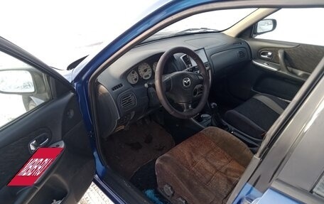 Mazda 323, 1999 год, 490 000 рублей, 13 фотография