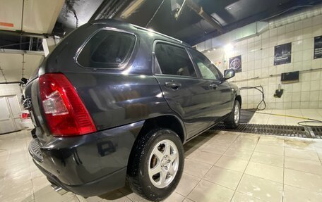 KIA Sportage II, 2010 год, 900 000 рублей, 11 фотография