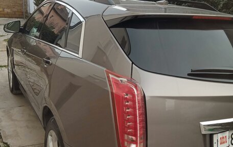 Cadillac SRX II рестайлинг, 2011 год, 995 000 рублей, 3 фотография