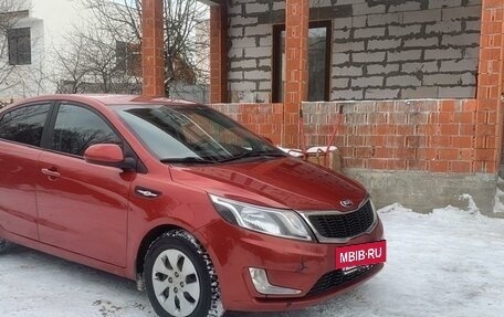 KIA Rio III рестайлинг, 2011 год, 830 000 рублей, 3 фотография