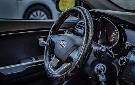 KIA Rio III рестайлинг, 2013 год, 734 000 рублей, 19 фотография