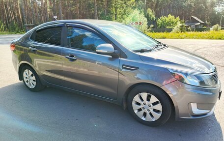 KIA Rio III рестайлинг, 2014 год, 800 000 рублей, 33 фотография