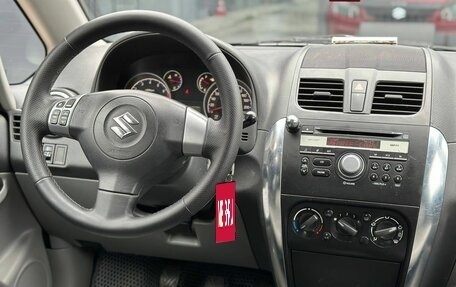 Suzuki SX4 II рестайлинг, 2010 год, 599 000 рублей, 21 фотография