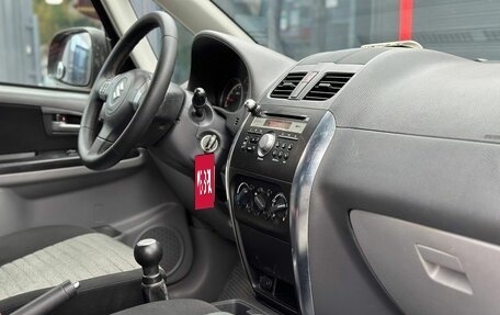 Suzuki SX4 II рестайлинг, 2010 год, 599 000 рублей, 22 фотография