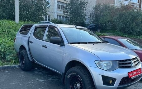 Mitsubishi L200 IV рестайлинг, 2010 год, 1 050 000 рублей, 2 фотография