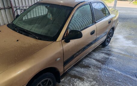 Mitsubishi Carisma I, 1999 год, 235 000 рублей, 4 фотография