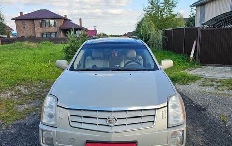 Cadillac SRX II рестайлинг, 2008 год, 650 000 рублей, 1 фотография