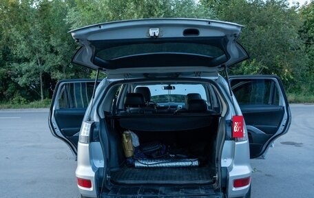Mitsubishi Outlander III рестайлинг 3, 2010 год, 1 050 000 рублей, 5 фотография