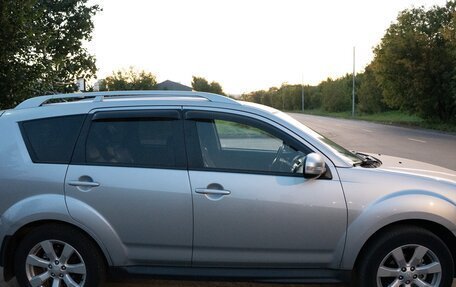 Mitsubishi Outlander III рестайлинг 3, 2010 год, 1 050 000 рублей, 13 фотография