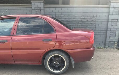 Mitsubishi Lancer VII, 1998 год, 210 000 рублей, 3 фотография