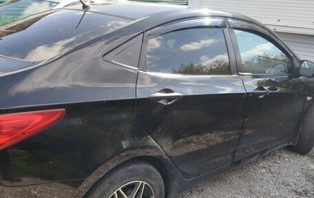 Hyundai Solaris II рестайлинг, 2011 год, 650 000 рублей, 2 фотография