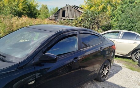Hyundai Solaris II рестайлинг, 2011 год, 650 000 рублей, 5 фотография