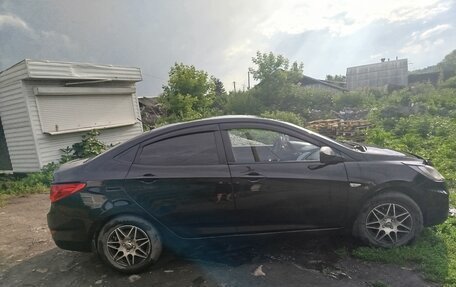 Hyundai Solaris II рестайлинг, 2011 год, 650 000 рублей, 10 фотография