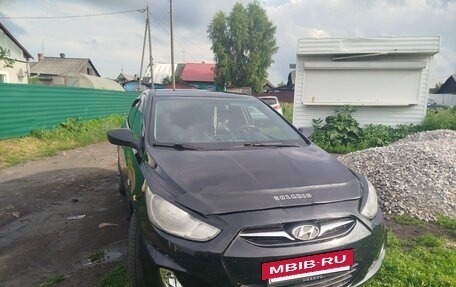 Hyundai Solaris II рестайлинг, 2011 год, 650 000 рублей, 8 фотография
