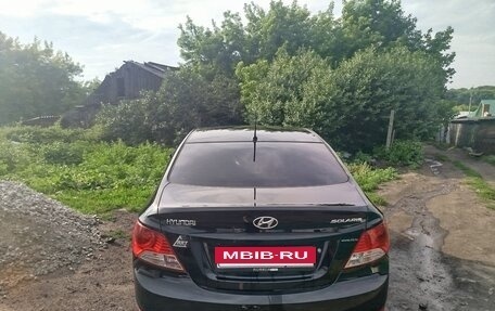 Hyundai Solaris II рестайлинг, 2011 год, 650 000 рублей, 13 фотография