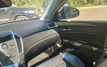 Cadillac SRX II рестайлинг, 2012 год, 1 400 000 рублей, 23 фотография
