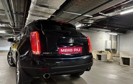 Cadillac SRX II рестайлинг, 2012 год, 1 400 000 рублей, 32 фотография
