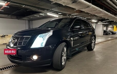 Cadillac SRX II рестайлинг, 2012 год, 1 400 000 рублей, 34 фотография