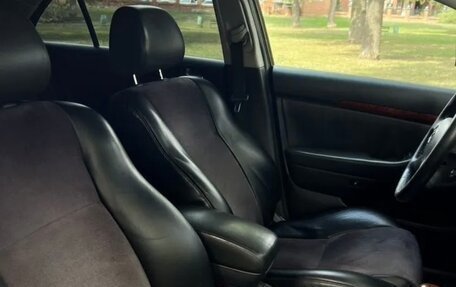 Toyota Avensis III рестайлинг, 2004 год, 700 000 рублей, 17 фотография