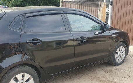KIA Rio III рестайлинг, 2012 год, 720 000 рублей, 2 фотография