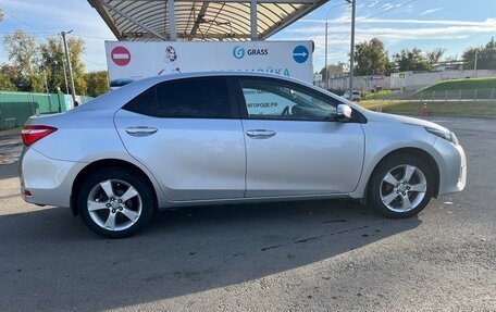 Toyota Corolla, 2013 год, 1 050 000 рублей, 5 фотография