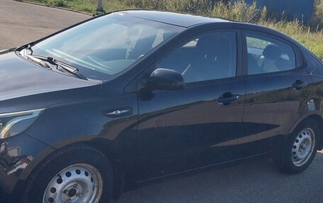 KIA Rio III рестайлинг, 2013 год, 940 000 рублей, 7 фотография