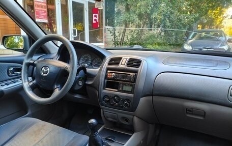 Mazda 323, 2002 год, 145 000 рублей, 9 фотография