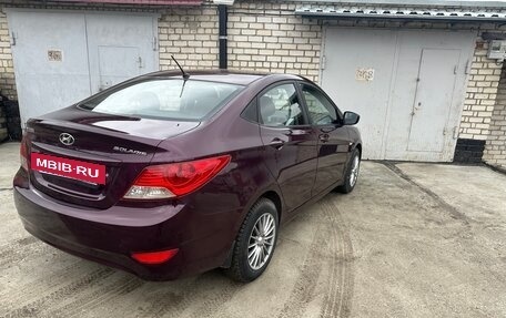 Hyundai Solaris II рестайлинг, 2011 год, 690 000 рублей, 5 фотография