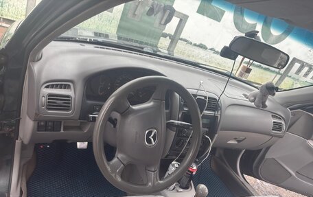 Mazda 626, 2000 год, 200 000 рублей, 13 фотография