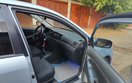 Toyota Corolla, 2004 год, 600 000 рублей, 10 фотография