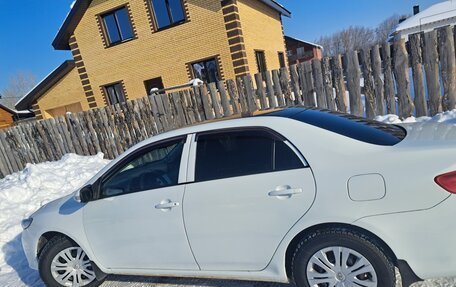 Toyota Corolla, 2011 год, 700 000 рублей, 7 фотография