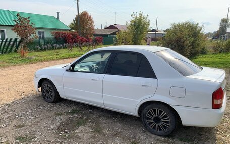 Mazda Familia, 1999 год, 320 000 рублей, 13 фотография