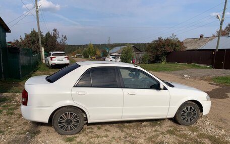Mazda Familia, 1999 год, 320 000 рублей, 11 фотография