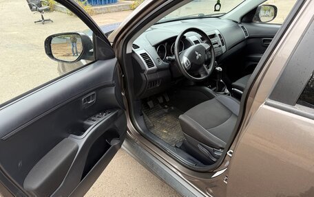 Mitsubishi Outlander III рестайлинг 3, 2011 год, 1 050 000 рублей, 13 фотография
