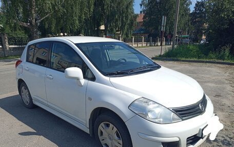 Nissan Tiida, 2011 год, 410 000 рублей, 34 фотография