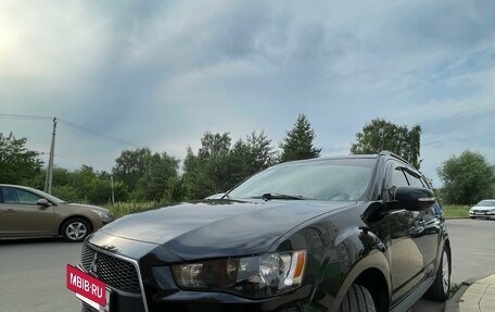 Mitsubishi Outlander III рестайлинг 3, 2011 год, 1 600 000 рублей, 11 фотография