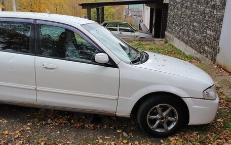 Mazda Familia, 2000 год, 210 000 рублей, 5 фотография