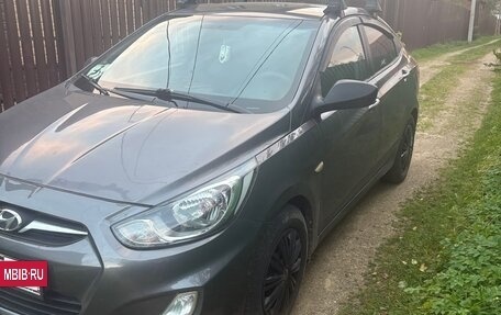 Hyundai Solaris II рестайлинг, 2011 год, 650 000 рублей, 3 фотография