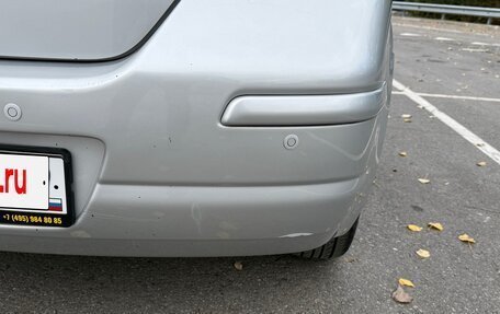 Nissan Tiida, 2010 год, 890 000 рублей, 7 фотография