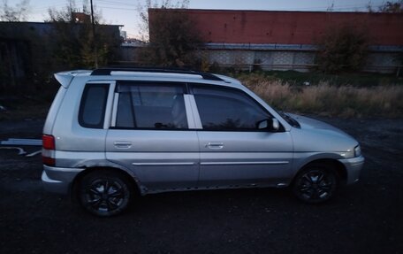 Mazda Demio III (DE), 1999 год, 160 000 рублей, 13 фотография