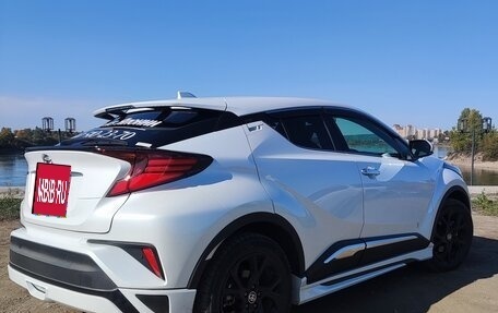 Toyota C-HR I рестайлинг, 2022 год, 2 300 000 рублей, 23 фотография