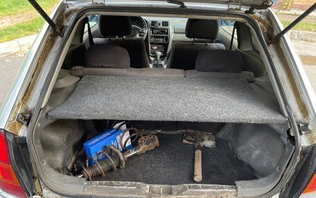 Mazda 323, 1999 год, 180 000 рублей, 12 фотография