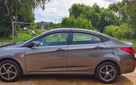 Hyundai Solaris II рестайлинг, 2011 год, 700 000 рублей, 5 фотография