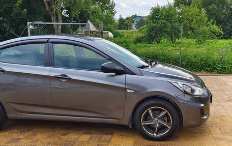 Hyundai Solaris II рестайлинг, 2011 год, 700 000 рублей, 14 фотография