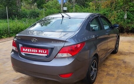 Hyundai Solaris II рестайлинг, 2011 год, 700 000 рублей, 10 фотография