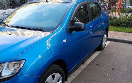 Renault Logan II, 2014 год, 700 000 рублей, 2 фотография