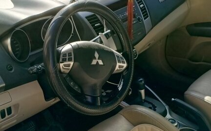 Mitsubishi Outlander III рестайлинг 3, 2008 год, 1 400 000 рублей, 11 фотография
