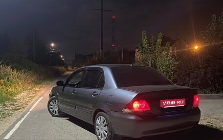 Mitsubishi Lancer IX, 2009 год, 310 000 рублей, 2 фотография